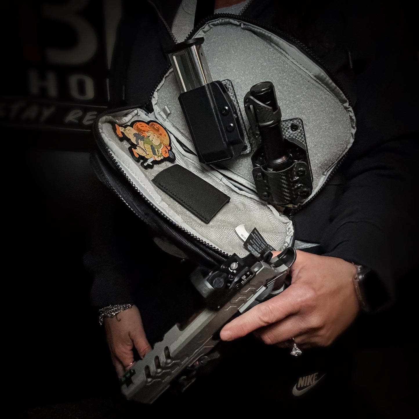 Hook and Loop magazine and accessory mount for backpacks and sling bags. Fits Velcro-compatible panels for secure off-body EDC carry. Made in the USA