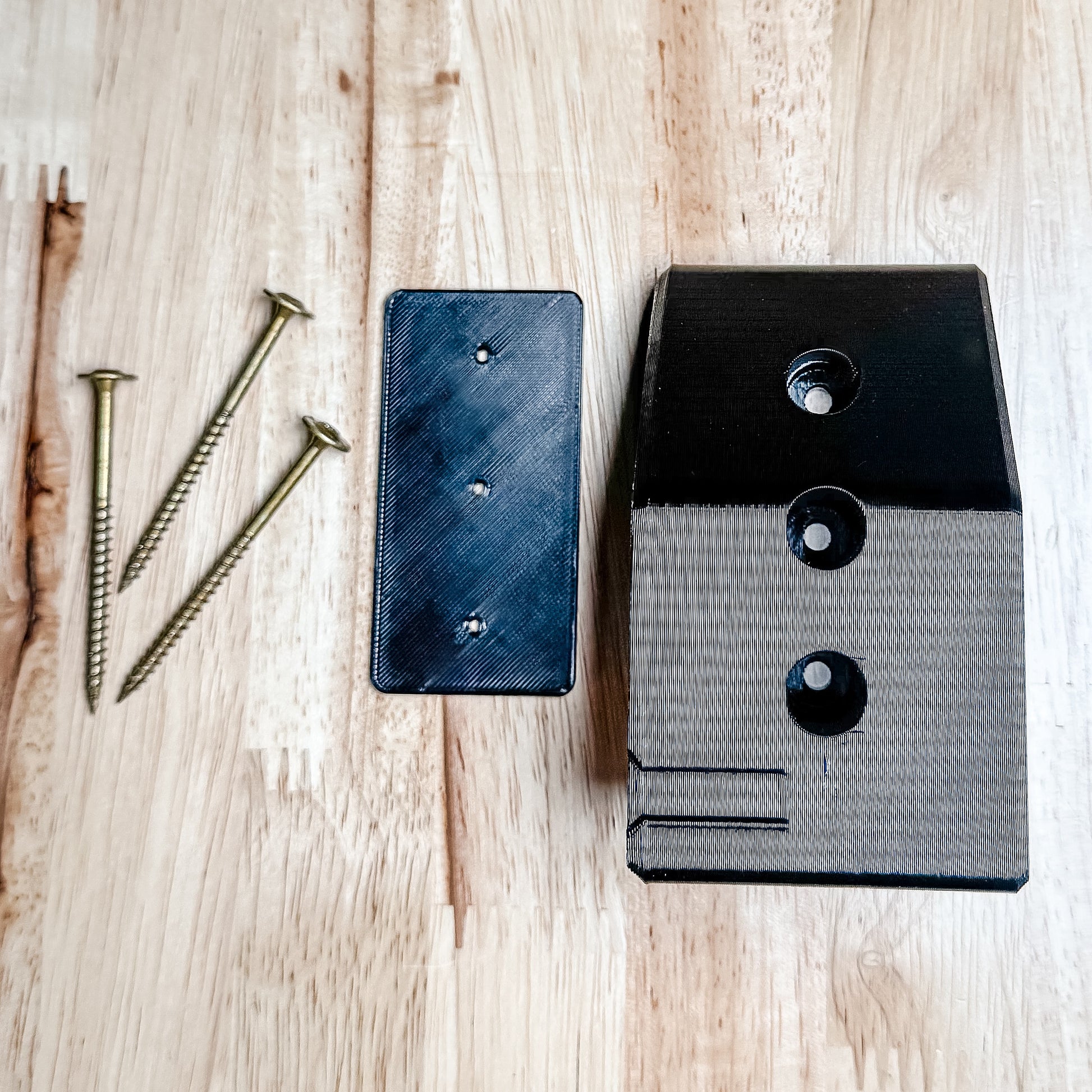 AR-15 rifle wall hanger designed for mil-spec lowers. Secure magwell retention, stud-mounted strength, and durable PETG construction. Made in USA