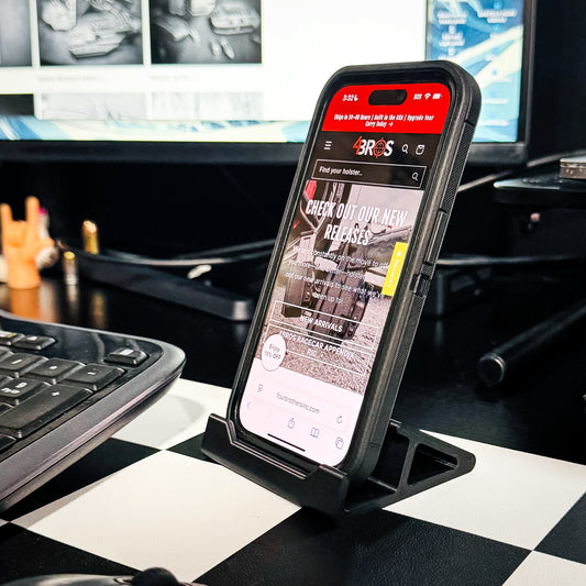 Compact smartphone stand designed and produced by Four Brothers Holsters