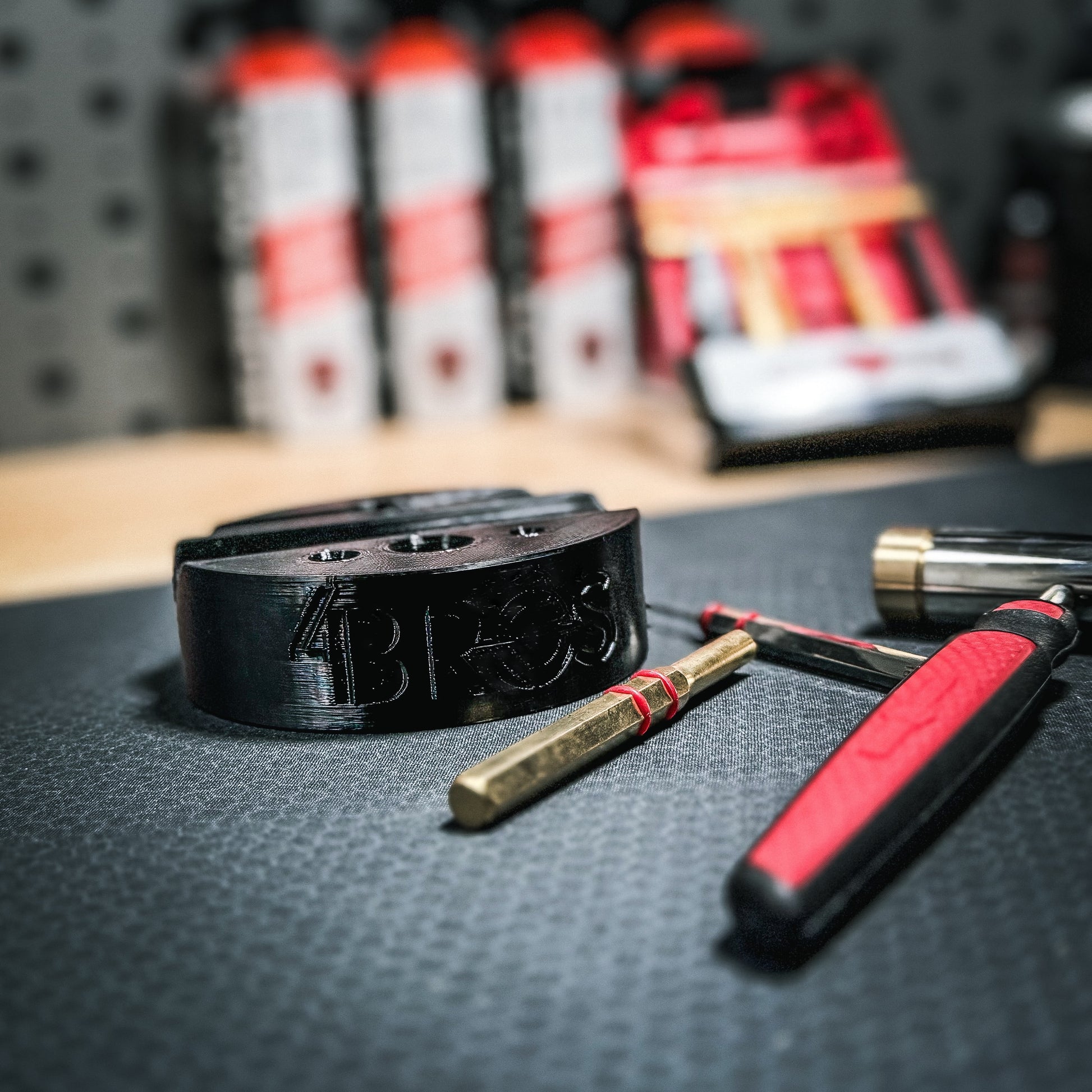 Armorer & Gunsmith 3D-printed Universal Bench Block from Four Brothers Holsters makes the removal of pins from firearms & devices simple, easy, and quick.