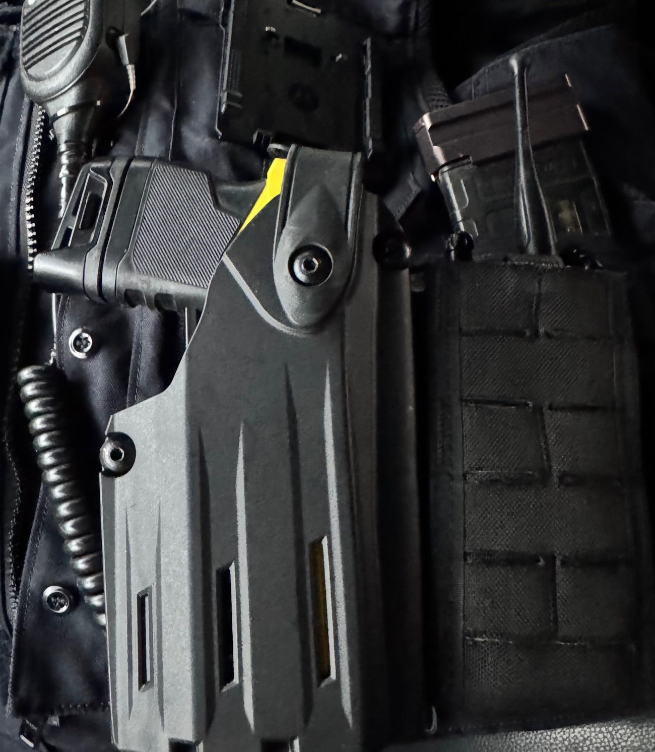 For the best Molle Adapter designed to fit the Safariland Taser 7 holster, shop Four Brothers 4BROS Holsters. Adjustable cant.  Proudly made in the USA.
