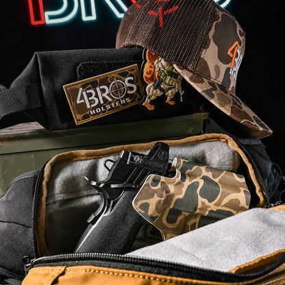 4BROS Holsters Logo Duck Camo PVC Patch measures 1 3/4" x 3 1/2" with a bold white logo on a duck camo background for range bags and gear.