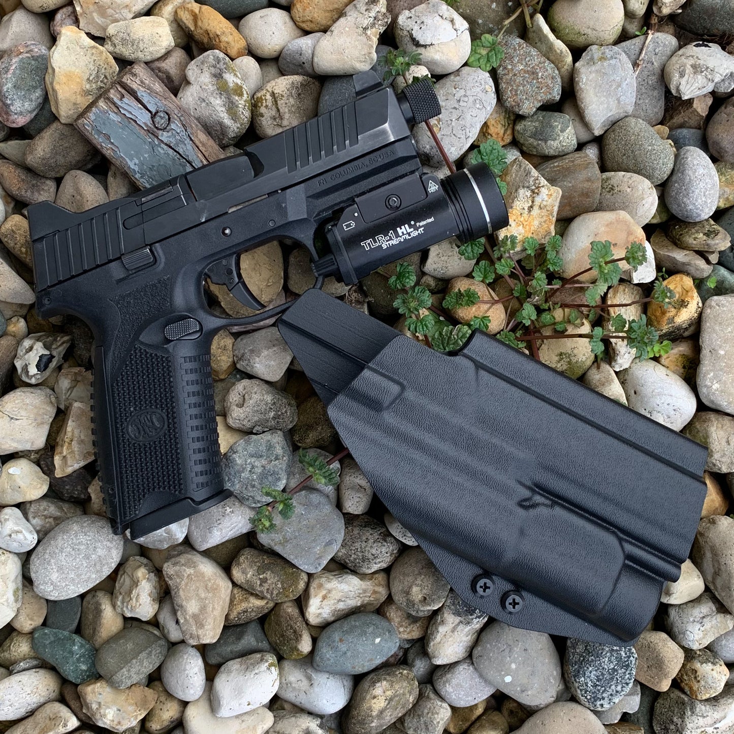 For the best Outside Waistband OWB Holster for the FN 509 Tactical with the Streamlight TLR-1 or TLR-1 HL weapon-mounted light, shop Four Brothers Holsters. 