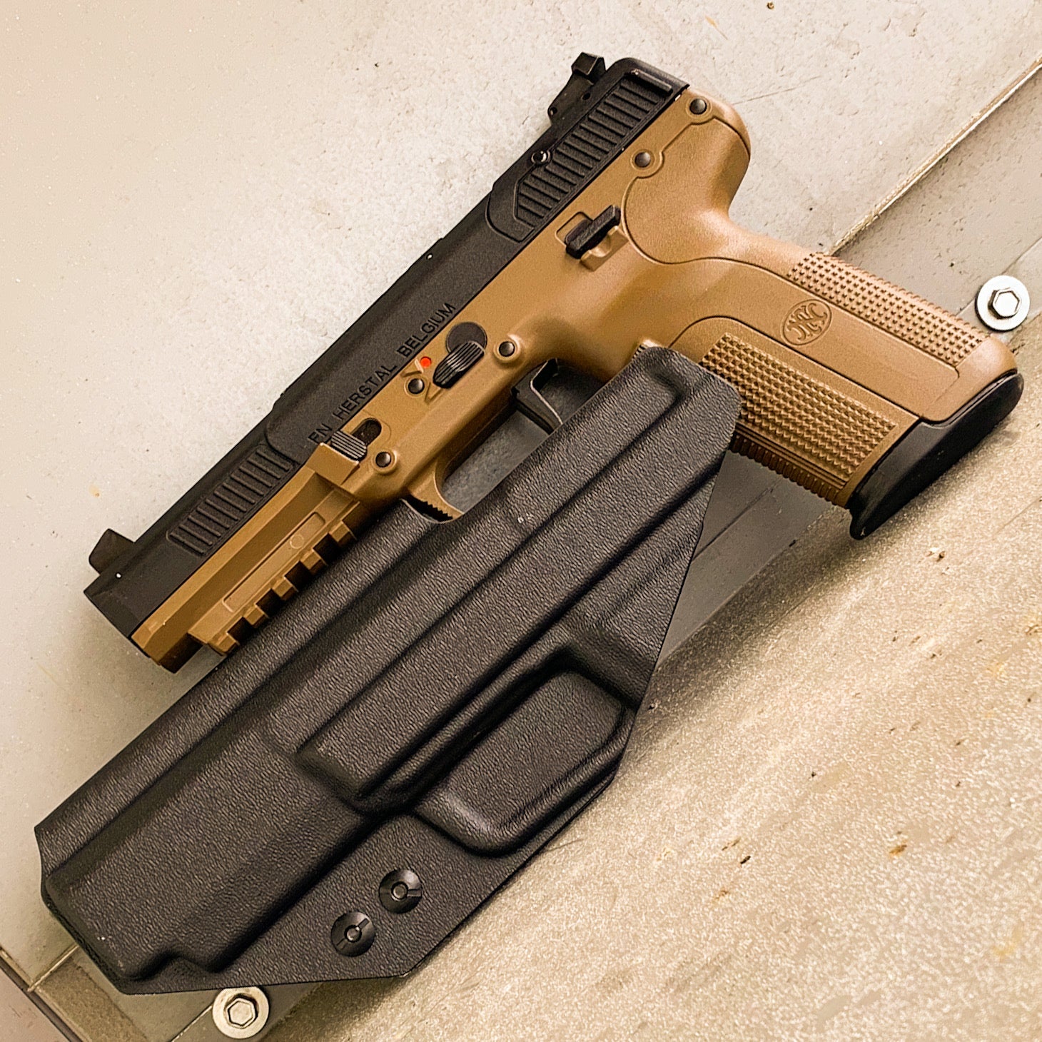 For the best Inside Waistband Holster IWB designed to fit the FN America Five-seveN pistol, shop Four Brothers 4BROS Holsters.  Proudly Made in the USA.