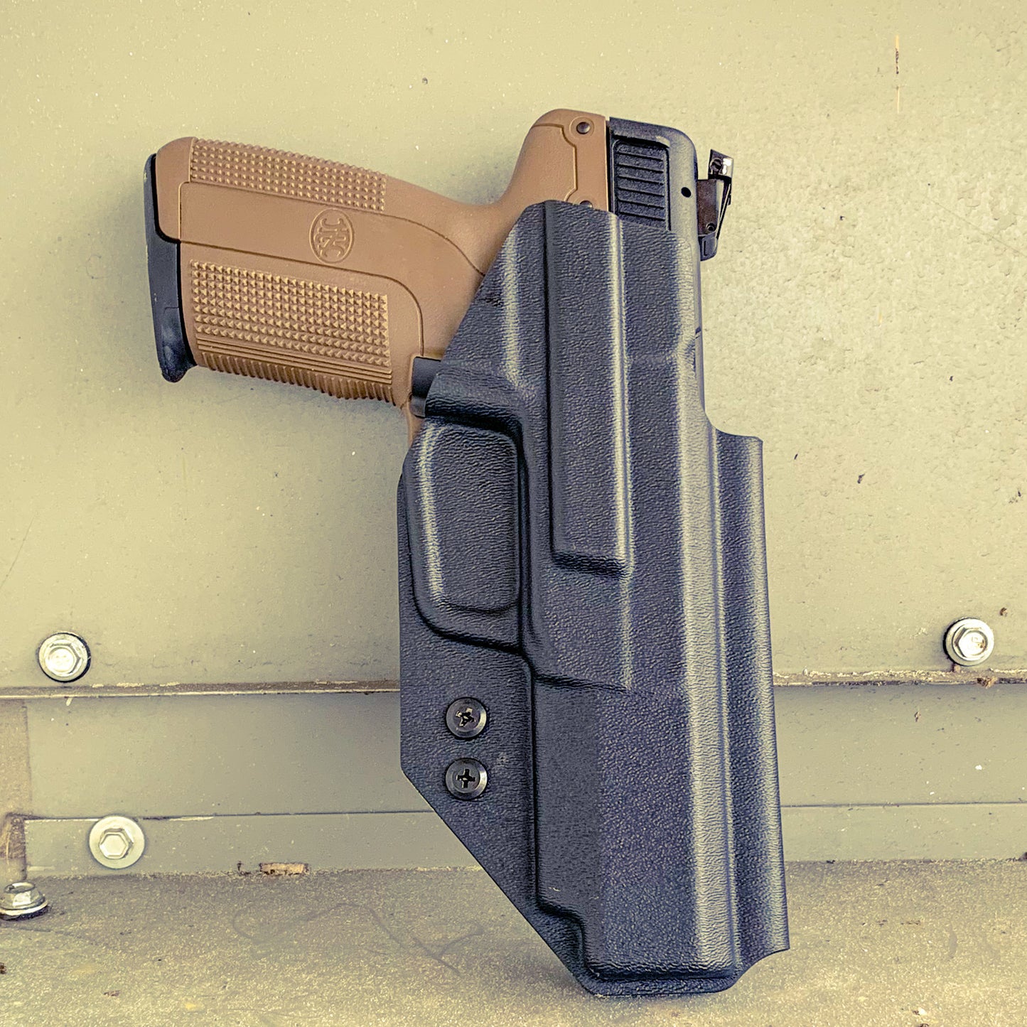 For the best Outside Waistband taco-style Kydex holster for the FN America Five-seveN  pistol, shop Four Brothers 4BROS Holsters.  Proudly Made in the USA 