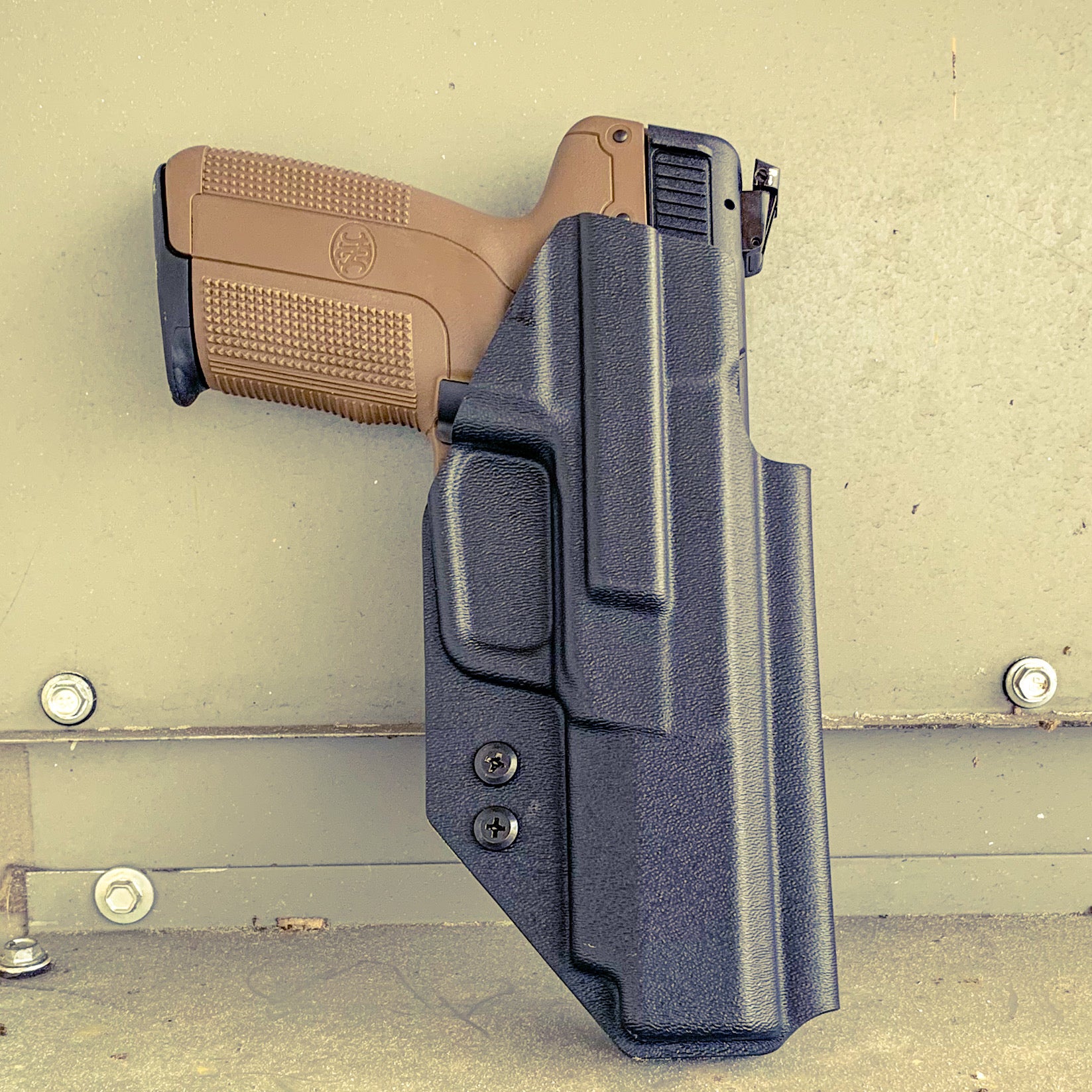 For the best Outside Waistband taco-style Kydex holster for the FN America Five-seveN  pistol, shop Four Brothers 4BROS Holsters.  Proudly Made in the USA 