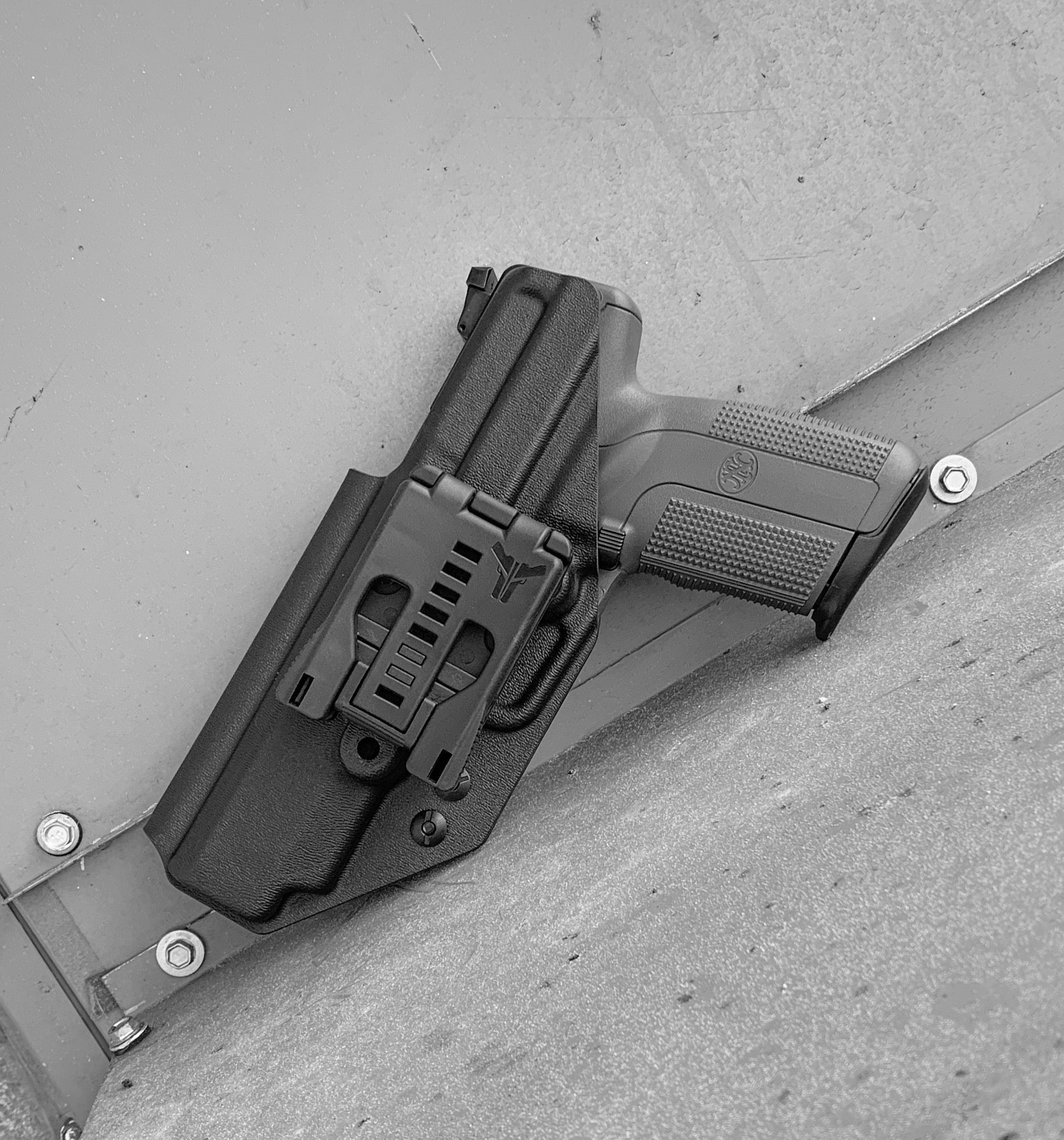 For the best Outside Waistband taco-style Kydex holster for the FN America Five-seveN  pistol, shop Four Brothers 4BROS Holsters.  Proudly Made in the USA 