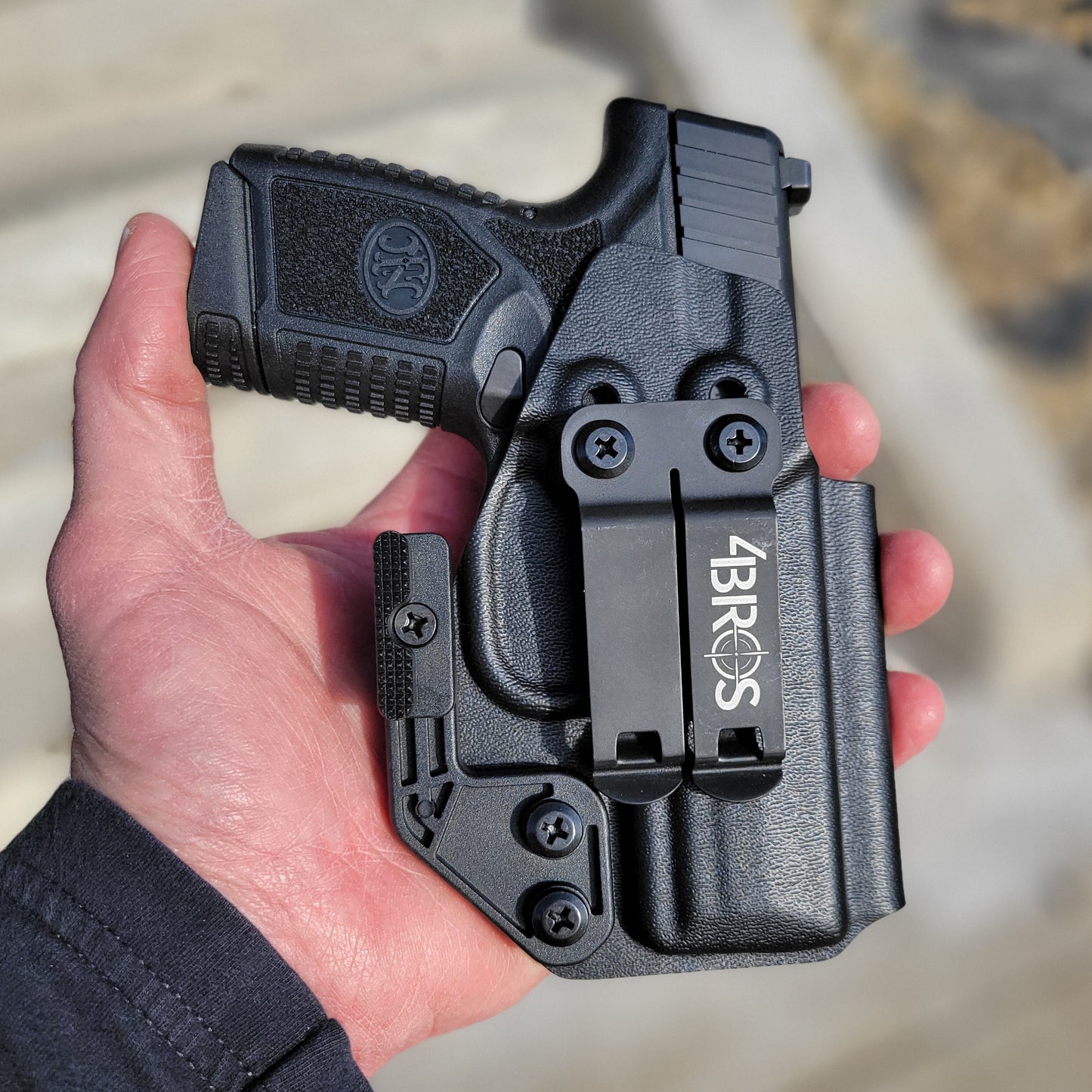 For the best, most comfortable and compact concealed IWB AIWB inside waistband holster designed for the FN Reflex pistol shop Four Brothers Holsters. Our holsters are vacuum formed with a precision machined mold designed from a CAD model of the actual firearm. Suitable for pocket carry. Made in the USA. FN REFLEX