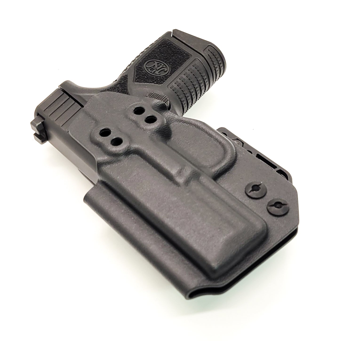 For the best, most comfortable and compact concealed IWB AIWB inside waistband holster designed for the FN Reflex pistol shop Four Brothers Holsters. Our holsters are vacuum formed with a precision machined mold designed from a CAD model of the actual firearm. Suitable for pocket carry. Made in the USA. FN REFLEX