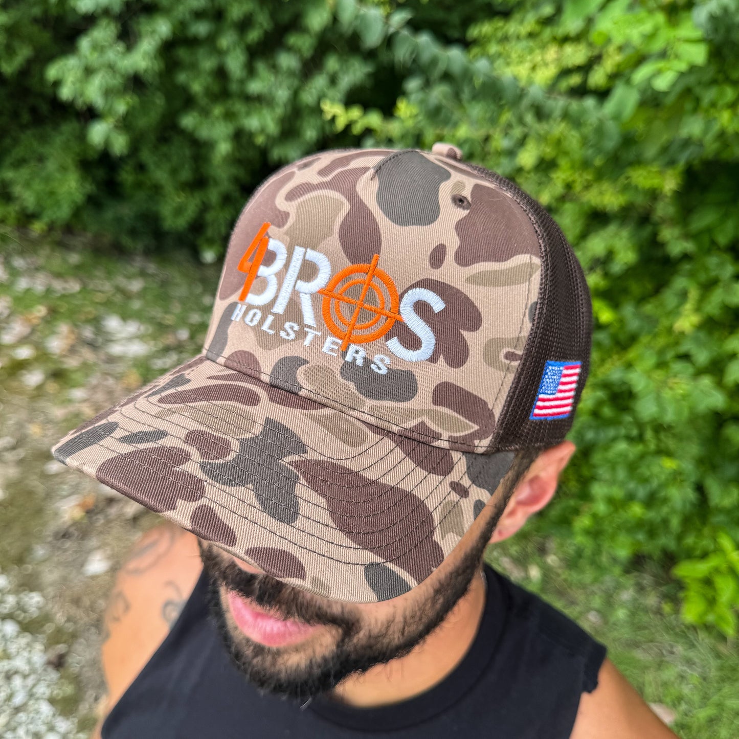 The Four Brothers Holsters 4Bros Duck Camo Trucker Hat isn't just your stay-at-home, clean-for-the-weekend hat. It is intended to be your everyday carry hat. 
