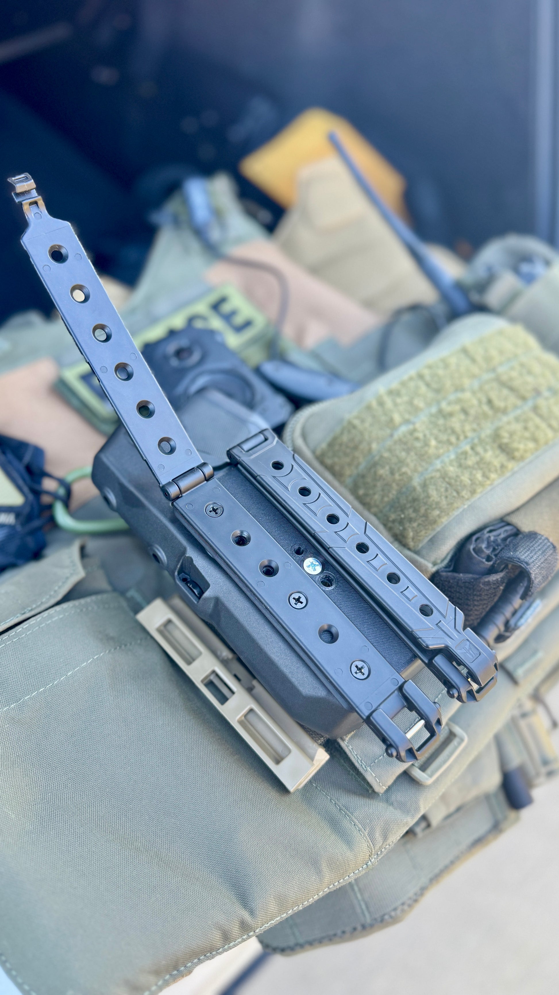 Four Brothers Holsters Straight Molle Revison 3 adapter for standard Blackhawk and Blade-Tech holster attachment pattern.   Buy today at Four Brothers Holsters.