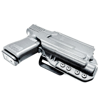 Outside Waistband (OWB) holster for Glock 19 & 45 with Streamlight TLR-1 HL-X. Built for duty and competition. Red dot ready, open muzzle, and made in the USA