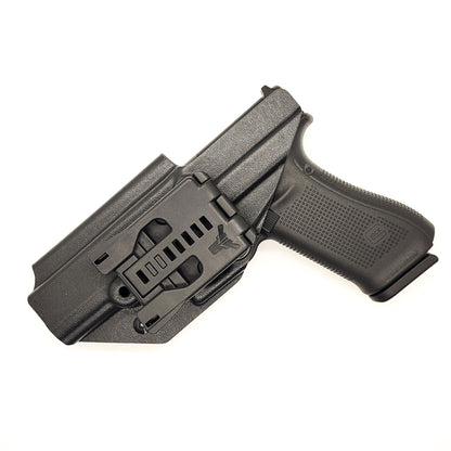 For the best Outside Waistband OWB Holster for the Glock 17, 22, 17 MOS, 22 MOS, Gen 4, Gen 5, compact & full size 9mm and 40 S&W shop Four Brothers holsters.
