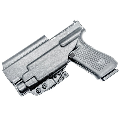 Black IWB Holster for Glock 17 & TLR-7 HL-X light with a DCC Monoblock and a Modwing.