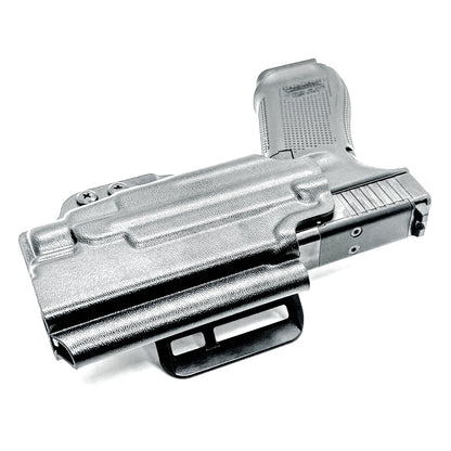 Glock 17 with TLR-7 HL-X outside waistband holster in black with 4BROS 1.5" Slide