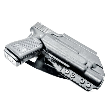 Duty & Competition Holster  for the Glock 19 or 45 with the Surefire X300.  Shown in black with a Duty Drop attachment.