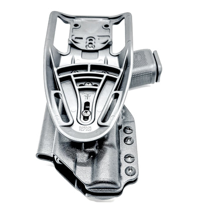 Duty & Competition Holster  for the Glock 19 or 45 with the Surefire X300.  Shown in black with a Duty Drop attachment.