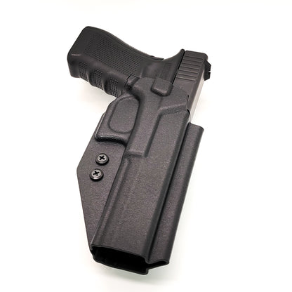 For the best outside waistband OWB holster for the Glock 34 Generation Gen 5, shop Four Brothers Holsters. Glock Gen 3 & 4 22, 17 MOS, Gen 3, 4 & 5 19, 23, 45 9mm Glock full size 9mm and 40 S&W frame pistols. The holster is cleared for a red dot sight. Adjustable Retention, molded with .080" Kydex, made in the USA.