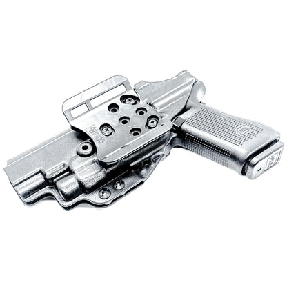 Glock 34 with TLR7 HL-X Outside Waistband Holster with 4BROS 1.5" Slide in black