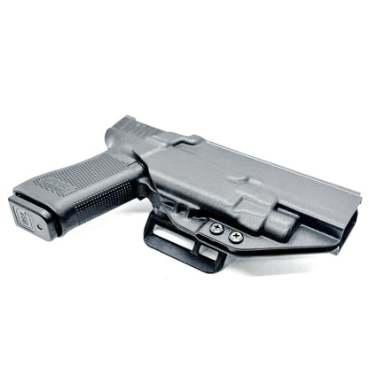 Glock 34 with TLR7 HL-X Outside Waistband Holster with 4BROS 1.5" Slide in black