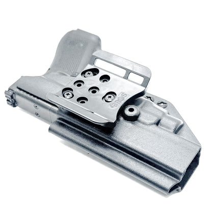 Glock 34 with TLR7 HL-X Outside Waistband Holster with 4BROS 1.5" Slide in black