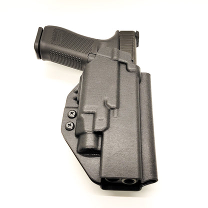 For the best Outside Waistband OWB Kydex holster designed to fit the Glock Gen 5 34 and 34 MOS with the Streamlight TLR-7 HL_X, TLR-7 X, & TLR-7 A, shop Four Brothers 4BROS holsters. Full sweat guard, adjustable retention, holster profile cut for red dot sights. Smooth edges for comfort and concealment. Made in the USA