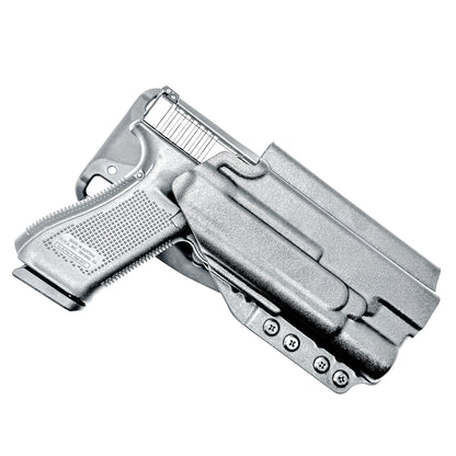 Black OWB Duty & Competition holster for the Glock 34 and Surefire X300 shown with Duty Drop attachment.