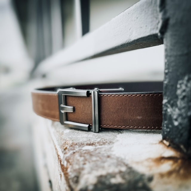 For the best concealed carry belt, shop Four Brothers Holsters for the Kore Essentials X3 belt.  The buckle design frees up space in front to hold your gear.