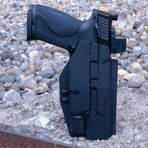 For the best OWB Outside Waistband Kydex Taco Style Holster designed to fit the Smith and Wesson M&P 10MM 5.6" Performance Center M2.0 pistol with thumb safety and Surefire X300U-A, X300U-B, X-300T-A, or X-300T-B weapon light shop four brothers.  Full sweat guard, adjustable retention, profiled for a red dot sight. Proudly made in the USA.  