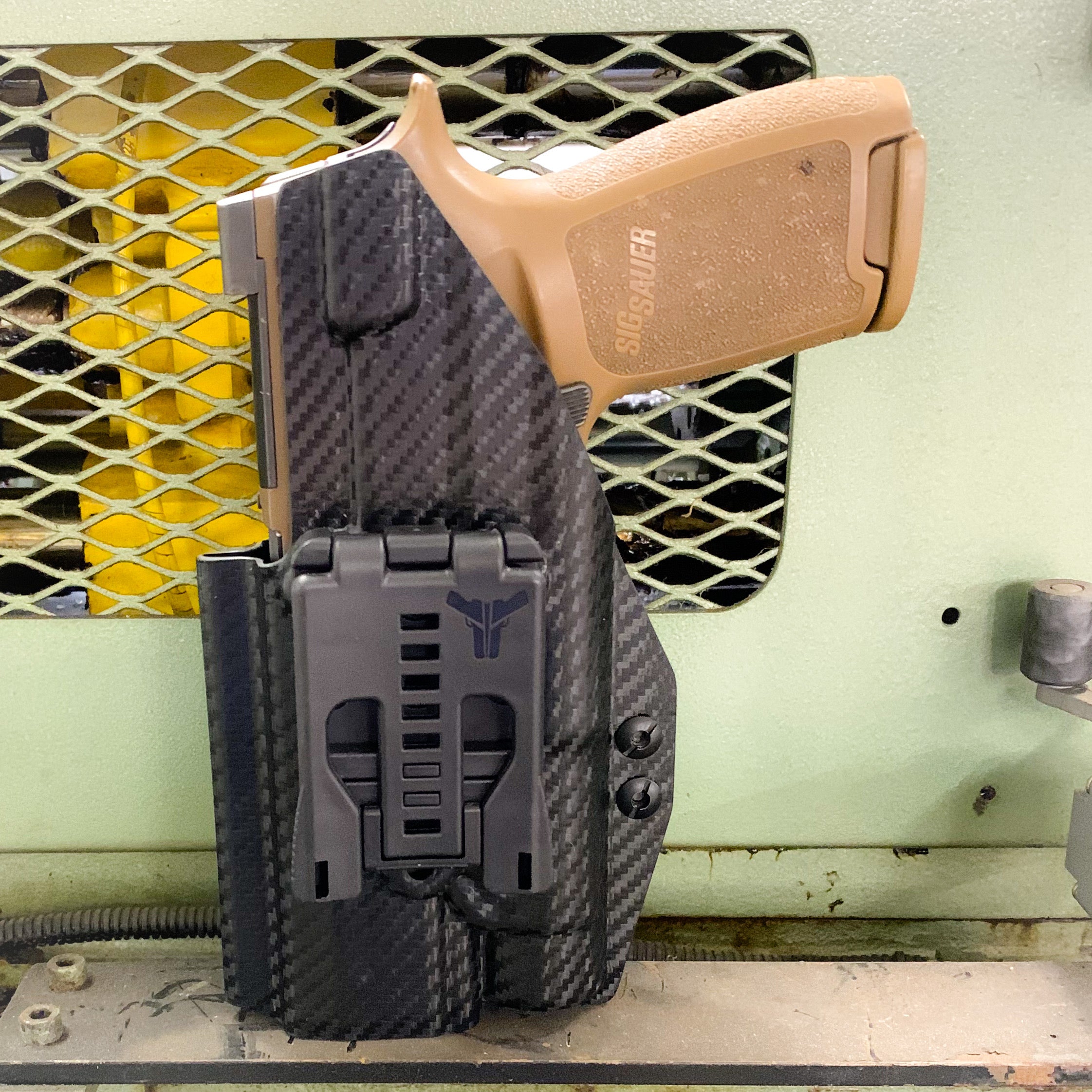 For the best Outside Waistband OWB Holster designed to fit the Sig Sauer P320 Full Size, Carry, Compact, M17, M18, and X-Five, X5 pistols with the Streamlight TLR-1, shop Four Brothers Holsters.  Full sweat guard, adjustable retention. Made from .080" kydex with minimal material and smooth edges to reduce printing 