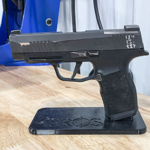 For the best 3D-printed Subcompact Pistol Stand confirmed to fit the Sig Sauer P365, P365XL, P365-XMACRO, Glock 43X and 48, Mischief Machine Grip P365 Grip Modules, Icarus Precision P365 Grip Modules, Springfield Hellcat and Hellcat Pro, shop Four Brothers Holsters. Printed in the USA with PETG plastic.