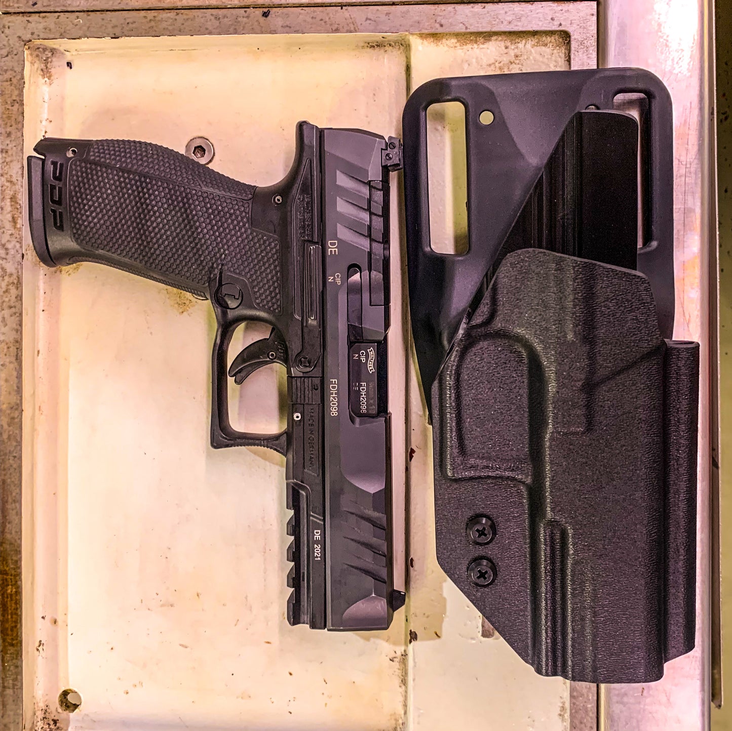 For the best outside waistband OWB Kydex duty or competition style holster designed to fit the Walther PDP 4.5" Full-Size and PDP Pro SD Compact 4" pistols shop Four Brothers Holsters. Cut for red dot sights, adjustable retention, and open muzzle for threaded barrel or compensator.