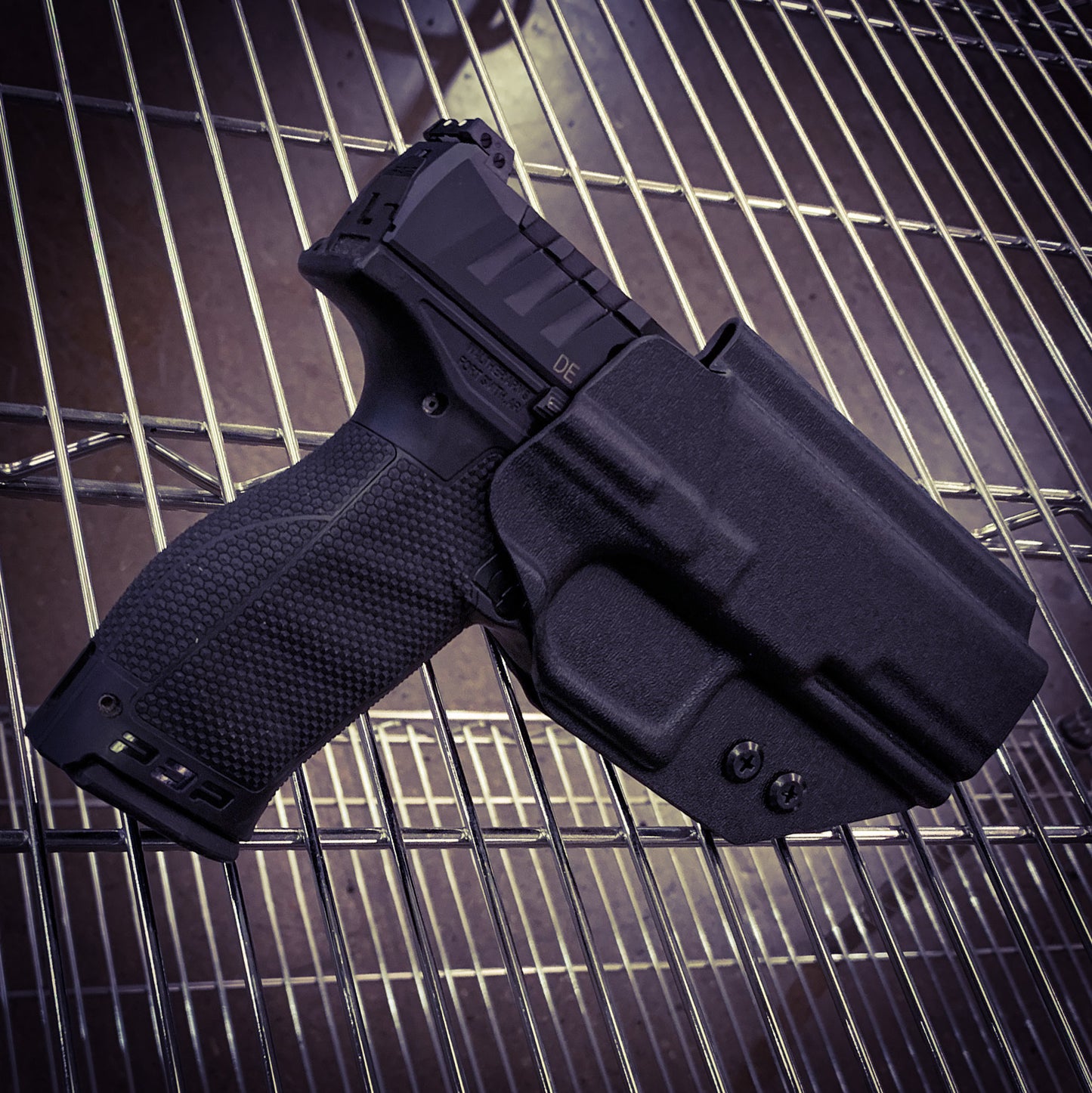 Outside Waistband Holster designed to fit the Walther PDP Full Size 4.5" pistol. Holster profile is cut to allow red dot sights to be mounted on the pistol.  This holster will fit the 4.5" Full Size, Full Size 4" and Compact. Full sweat guard, adjustable retention and open muzzle for threaded barrels and compensators.