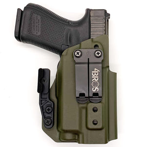 Inside Waistband Holster designed to fit a Glock 19, 23, 32, 19X, or 45 with the Nightstick TCM-550XL or TCM-550XLS light mounted to the pistol. Retention of the holster is on the light itself; the holster will retain the pistol without the light mounted to the firearm. Proudly made in the USA