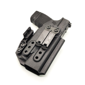 Inside Waistband Holster designed to fit the Springfield Hellcat pistol with the Streamlight TLR-7 Sub light mounted to the handgun. The holster retention is on the light itself and not the pistol. Full sweat guard, adjustable retention, minimal material, and smooth edges to reduce printing. Made in the USA.