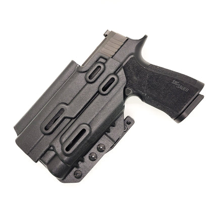 For the best inside IWB AIWB Waistband Taco Style Kydex Holster designed to fit the Sig Sauer P320-XTEN Comp with the Streamlight TLR-1 or TLR-1 HL attached to the pistol shop Four Brothers Holsters. Full Sweat Guard, Adjustable Retention. Profile cut to allow red dot sights. Made in the USA. P 320 XTEN P320 XTEN