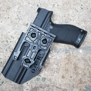 Outside Waistband Holster designed to fit the Walther PDP Compact pistol. Holster profile is cut to allow red dot sights to be mounted on the pistol.  Holster features full sweat guard, adjustable retention and open muzzle for threaded barrels and compensators.