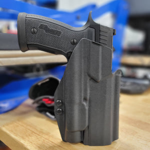 For the best OWB Outside Waistband Holster designed to fit the Sig Sauer P320 AXG & AXG Pro pistols with the Streamlight TLR-1 or TLR-1 HL light, look no further than Four Brothers. This holster will hold the Full Size, Carry, M18, M17, X-Five, and X-Five Legion with a TLR-1HL light. Open Muzzle Adjustable Retention