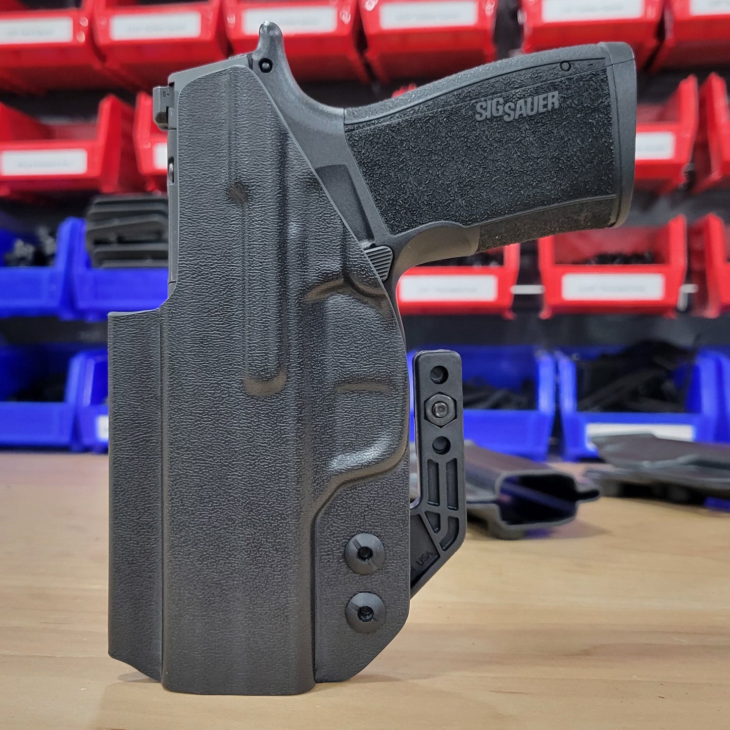 For the 2023 best Inside Waistband IWB AIWB Kydex Holster designed to fit the Sig Sauer P365-XMACRO COMP, P365-XMACRO, P365-XMACRO TACOPS, and P365-XMACRO COMP ROMEOZERO ELITE handgun, shop Four Brothers Holsters.  Full sweat guard, adjustable retention. Open muzzle for threaded barrel and cleared for red dot sights. 