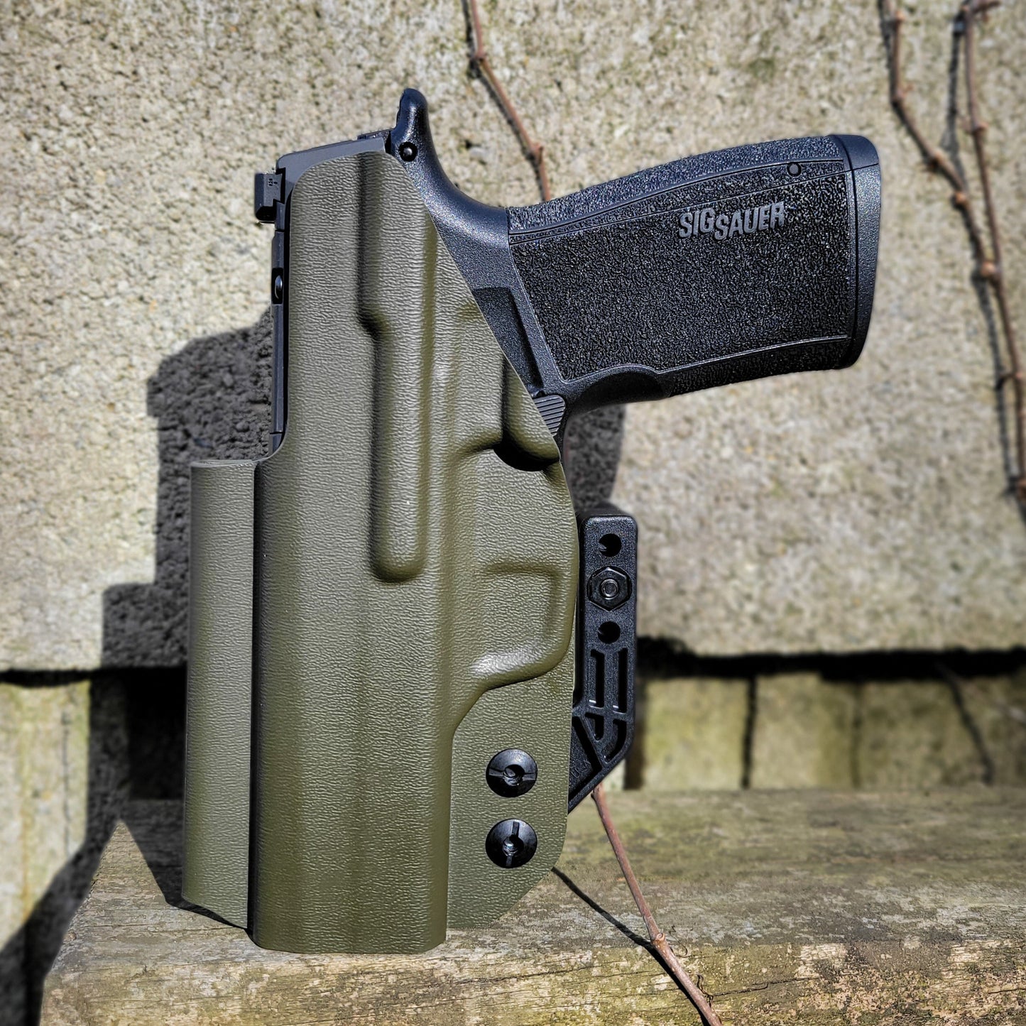 For the 2023 best Inside Waistband IWB AIWB Kydex Holster designed to fit the Sig Sauer P365-XMACRO COMP, P365-XMACRO, P365-XMACRO TACOPS, and P365-XMACRO COMP ROMEOZERO ELITE handgun, shop Four Brothers Holsters.  Full sweat guard, adjustable retention. Open muzzle for threaded barrel and cleared for red dot sights. 