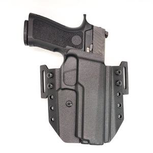 For the 2023 Best Outside Waistband Pancake Style Kydex holster designed to fit the Sig Sauer P320, shop Four Brothers Holsters  Full sweat guard, adjustable retention, open muzzle, cleared for a red dot sight. Made in the USA P320 Full Size, X5 X-FIVE, M17, M18, Carry, XCarry, XCompact, and Compact. Cant and Concealed