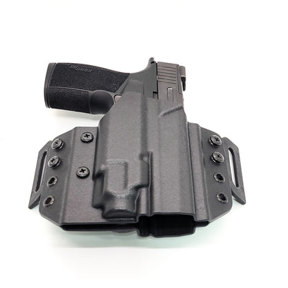 Get the best pancake-style OWB holster for your Sig Sauer P365X-MACRO, Macro TACOPS, or Macro COMP and Streamlight TLR-8 Sub at Four Brothers Holsters. Open Muzzle, Full Sweat Guard, Adjustable retention, Optic, and Red Dot ready. Made in the USA. P365 P 365 X MACRO XMACRO TLR8 TLR 8 G Pancake