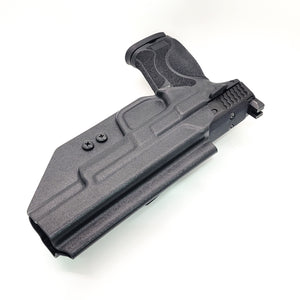 For the best OWB Outside Waistband Kydex Taco Style Holster designed to fit the Smith and Wesson M&P 5.6" Performance Center, 46" and 4" 10MM M2.0 pistol with or without thumb safety, shop Four Brothers Holsters. Full sweat guard, adjustable retention, profiled for a red dot sight. Proudly made in the USA.