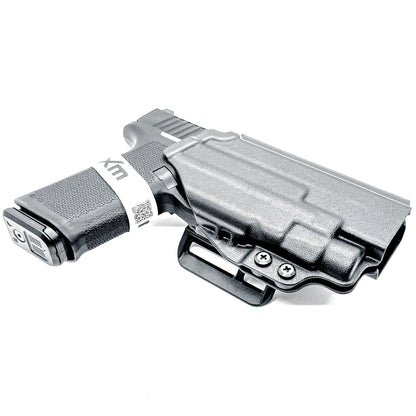 Ruger RXM 4.5" & TLR-7 HL-X OWB holster for Outside Waistband carry. Durable taco-style design with adjustable retention and optics-ready fit.