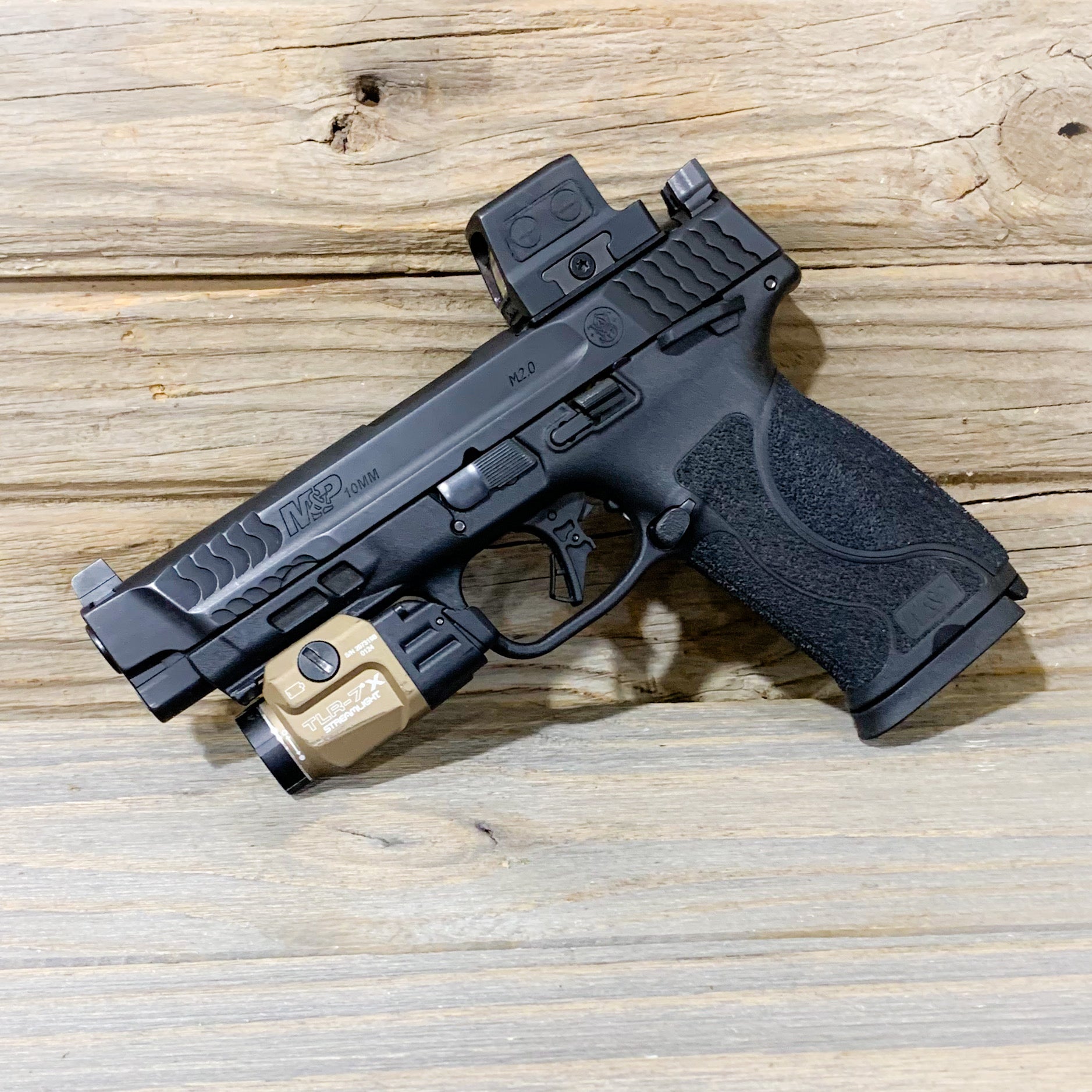 For the best Outside Waistband Kydex Duty & Competition Holster for the Smith and Wesson M&P 4.6" 10MM M2.0 pistol with thumb safety and Streamlight TLR-7, TLR-7A or TLR-7X shop Four Brothers Holsters. Full sweat guard, adjustable retention, cleared for red dot sights. Made in the USA for veterans and law enforcement.