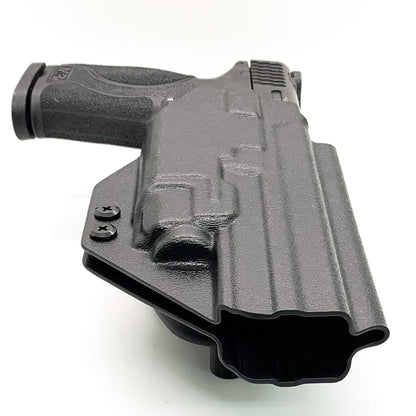 For the best Outside Waistband Duty & Competition OWB Kydex Holster designed to fit the Smith & Wesson Performance Center M&P M2.0 5.6" 10MM pistol with thumb safety and Streamlight TLR-8A weapon light shop Four Brothers Holsters.  Full sweat guard, adjustable retention, profiled for a red dot sight. Made in the USA.