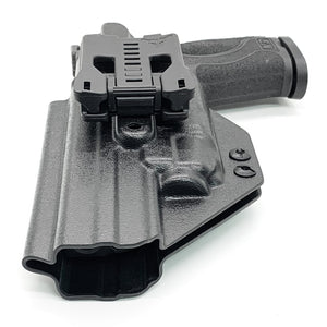 For the best, Outside Waistband OWB Kydex Holster designed to fit the Smith & Wesson M&P 10mm 5.6" Performance Center M2.0 pistol with thumb safety & TLR-8A handgun, shop Four Brothers Holsters.  Full sweat guard, adjustable retention. Made in USA Open muzzle for threaded barrels, cleared for red dot sights.  