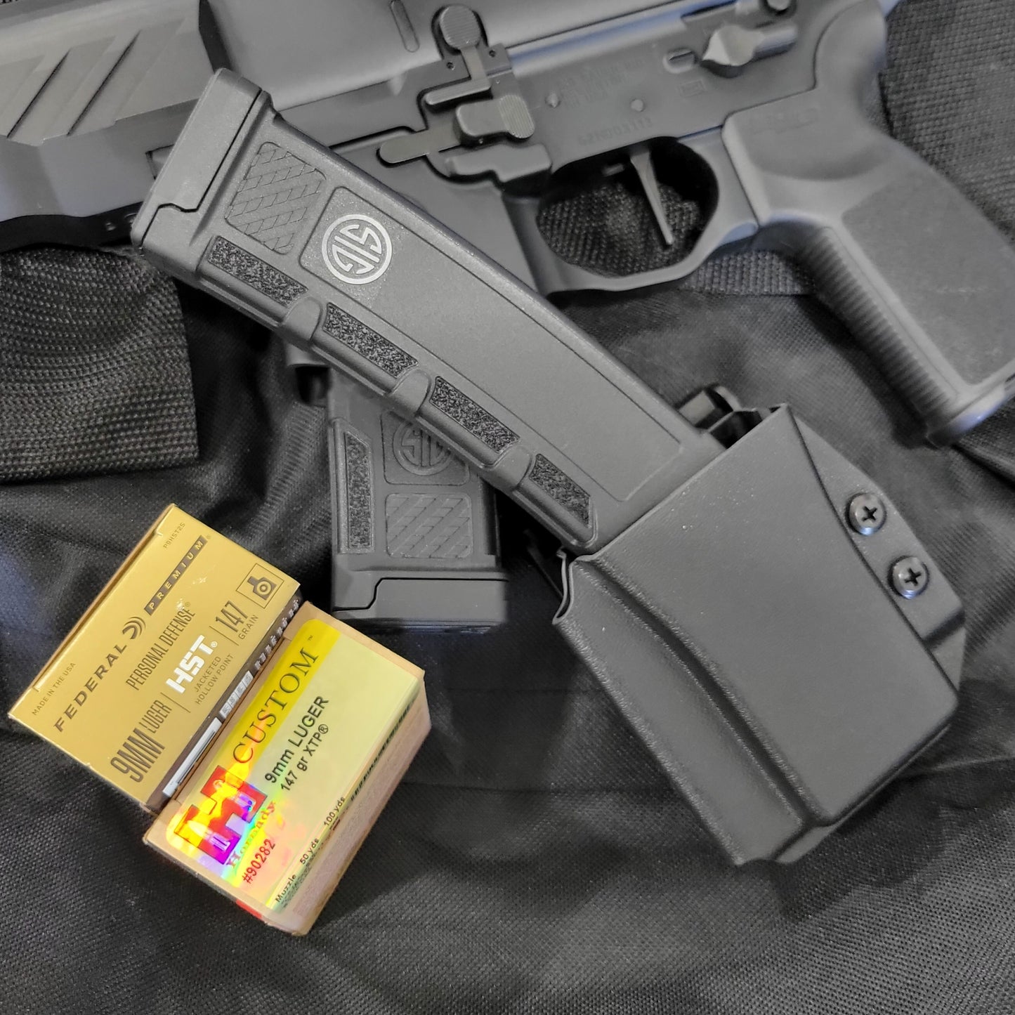 For the best OWB Sig Sauer MPX Magazine carrier of 2023, look no further than Four Brothers Inc.! Our MPX magazine holster is the perfect accessory for keeping your extra magazines secure and easily accessible. Keywords: competition, magazine holster, bullets forward, bullets back, range day, everyday carry, firearms.