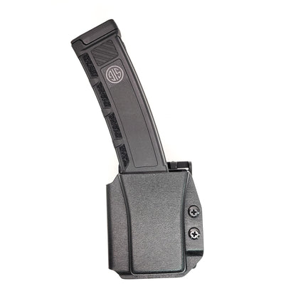 For the best OWB Sig Sauer MPX Magazine carrier of 2023, look no further than Four Brothers Inc.! Our MPX magazine holster is the perfect accessory for keeping your extra magazines secure and easily accessible. Keywords: competition, magazine holster, bullets forward, bullets back, range day, everyday carry, firearms.