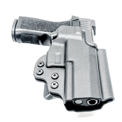 OWB Outside Waistband Holster for the Sig Sauer P320 Carry, Compact, M18 pistols, and Wilson Combat Carry grip module in black with a 4BROS 1.5" Belt Slide.